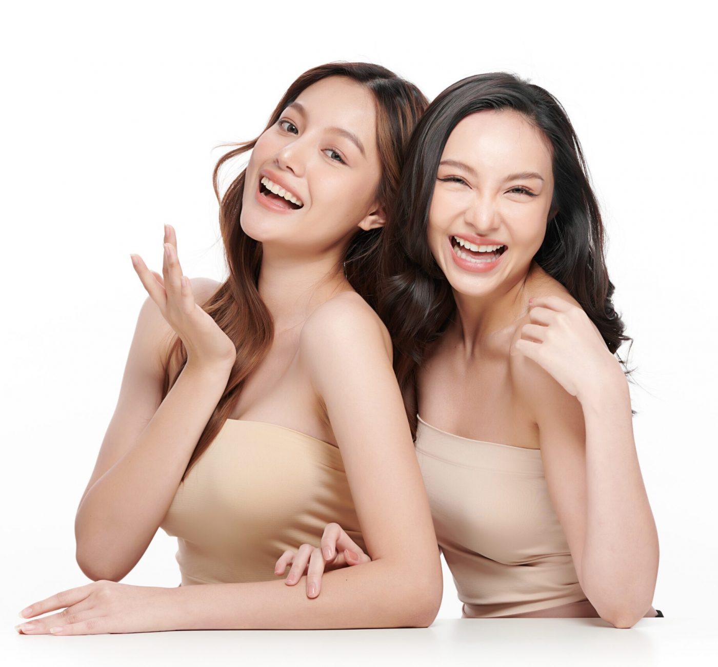 Two,Beautiful,Young,Asian,Woman,With,Clean,Fresh,Skin,On